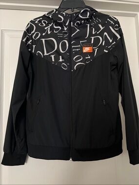 Nike Black Windbreaker with White Script Yoke and Orange Logo